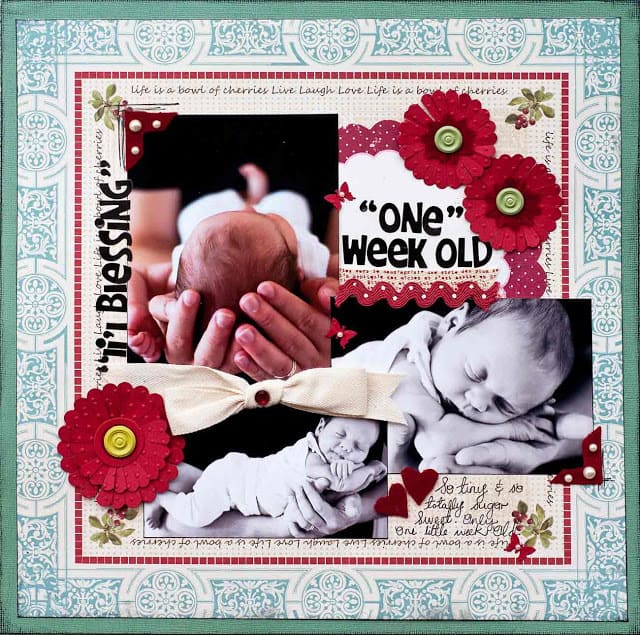 Scrapbook layout of my newborn daughter against her dads hands