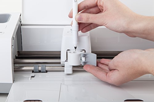 Insetting pen into clamp on Cricut machine