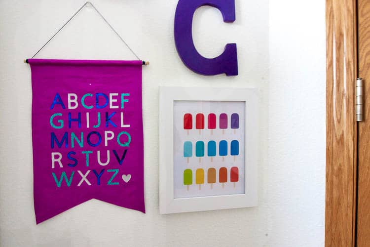 colorful nursery gallery wall