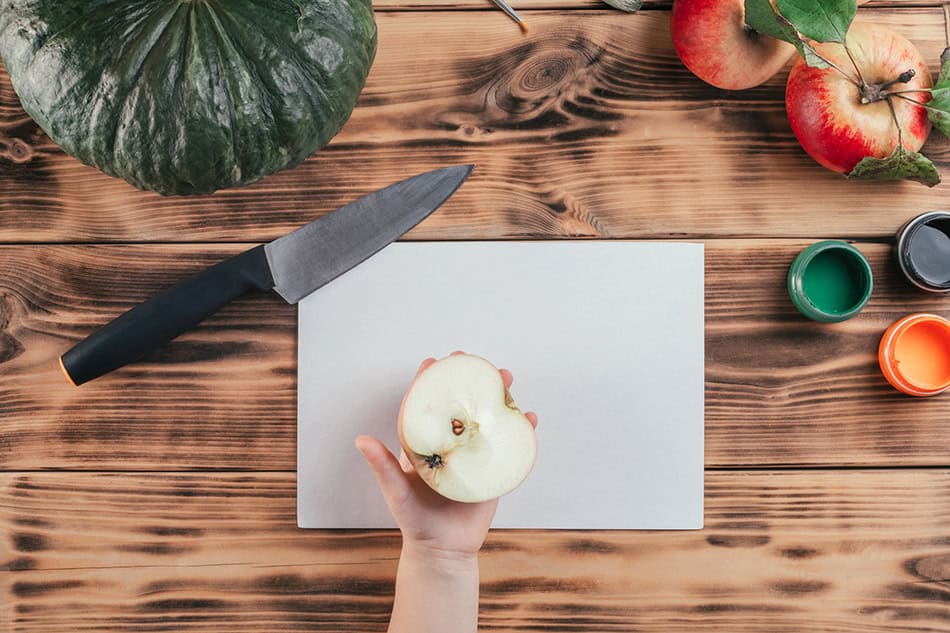 Apple pumpkin stamping craft for kids apple cut in half