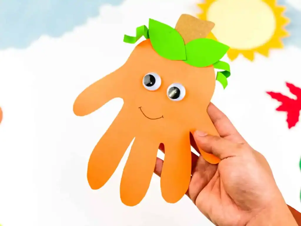 Easy And Cute Handprint Pumpkin Craft by In the play room