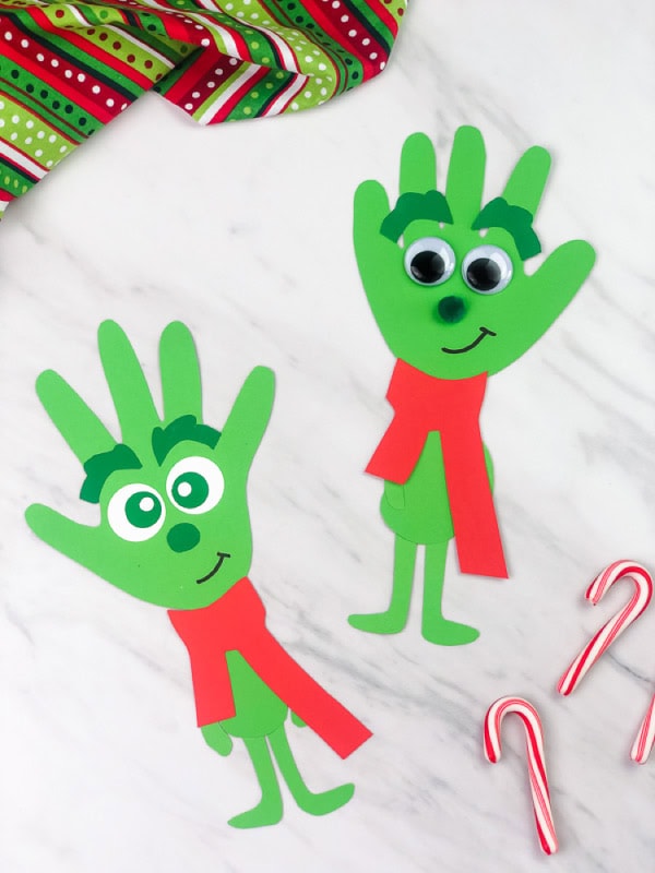 Grinch Handprint Craft For Christmas by simple every day mom