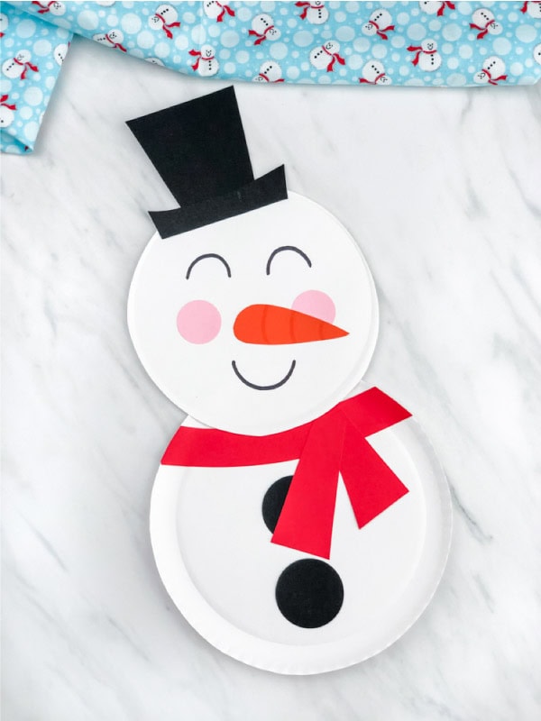 Snowman Paper Plate Craft For Kids by simple everyday mom