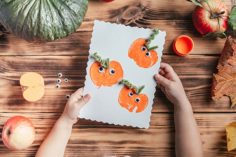 pumpkin art crafts preschool kids using apple stamps and paint