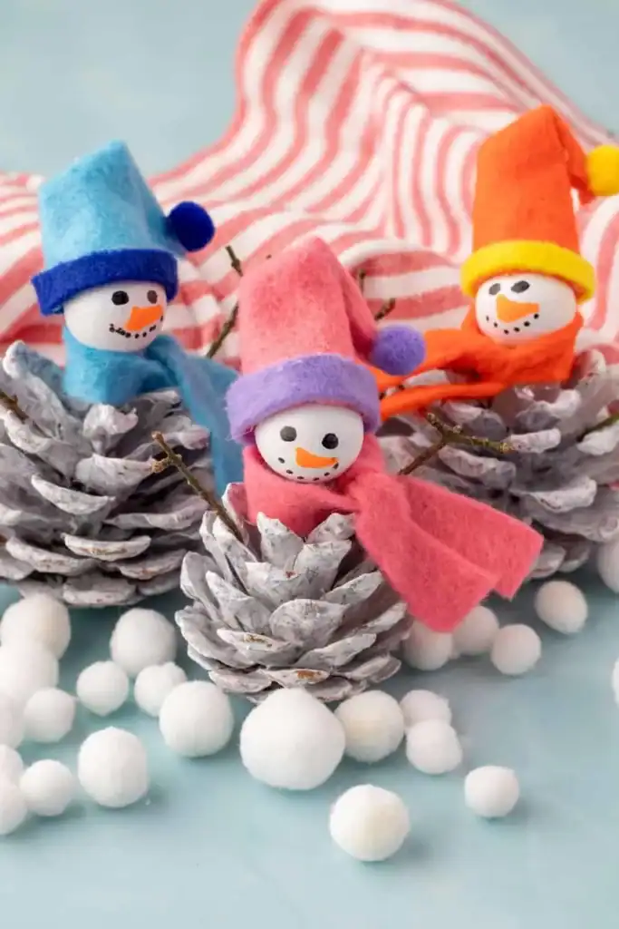 Cute Snowman Pine Cone Craft by Hello Wonderful