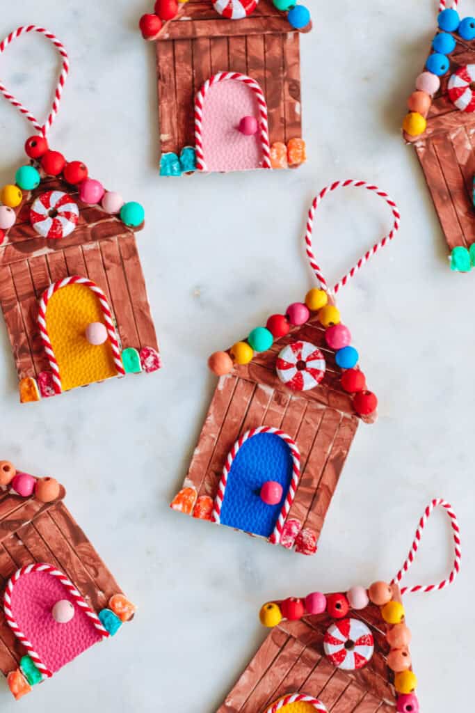 DIY Popsicle Stick Gingerbread House Ornaments by Studio DIY