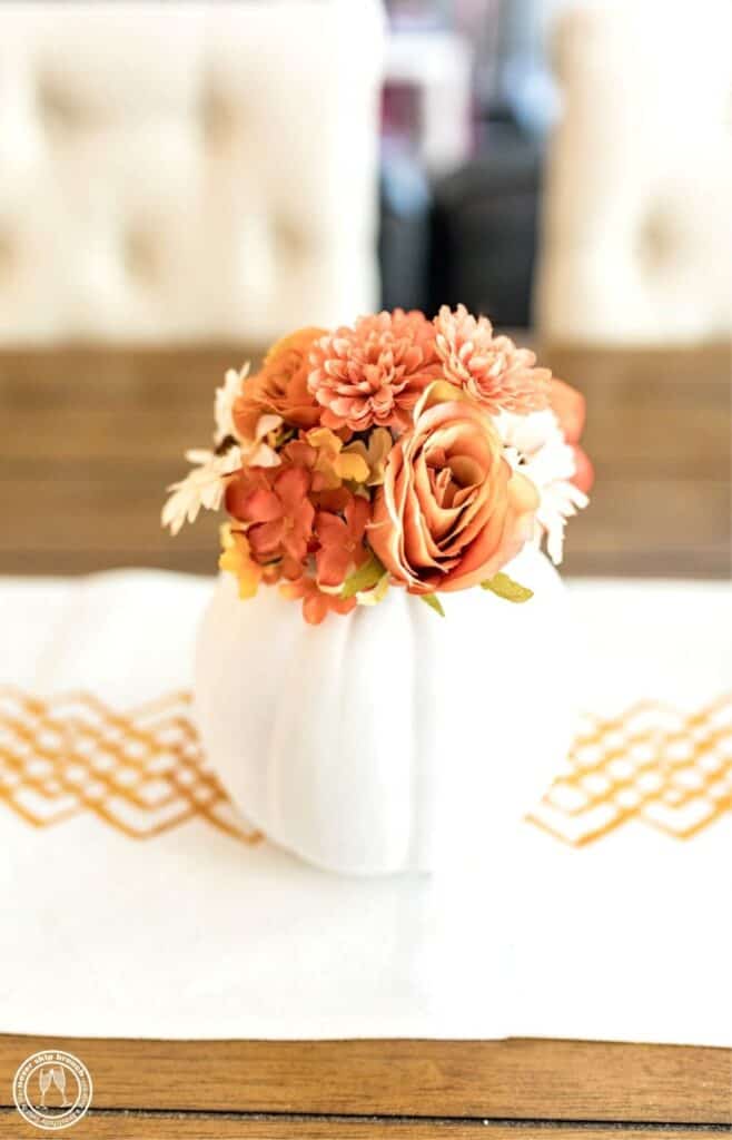 DIY fall floral pumpkin centerpiece by Never Skip Brunch