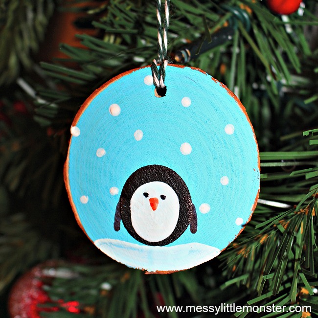 Fingerprint Penguin Wood Slice Christmas Ornaments by Messy Little Monster