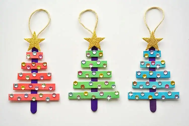 Glittering Popsicle Stick Christmas Trees by One Little Project