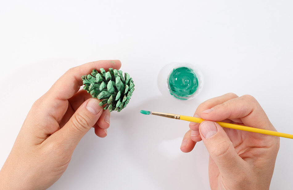 Pinecone dinosaur craft for kids