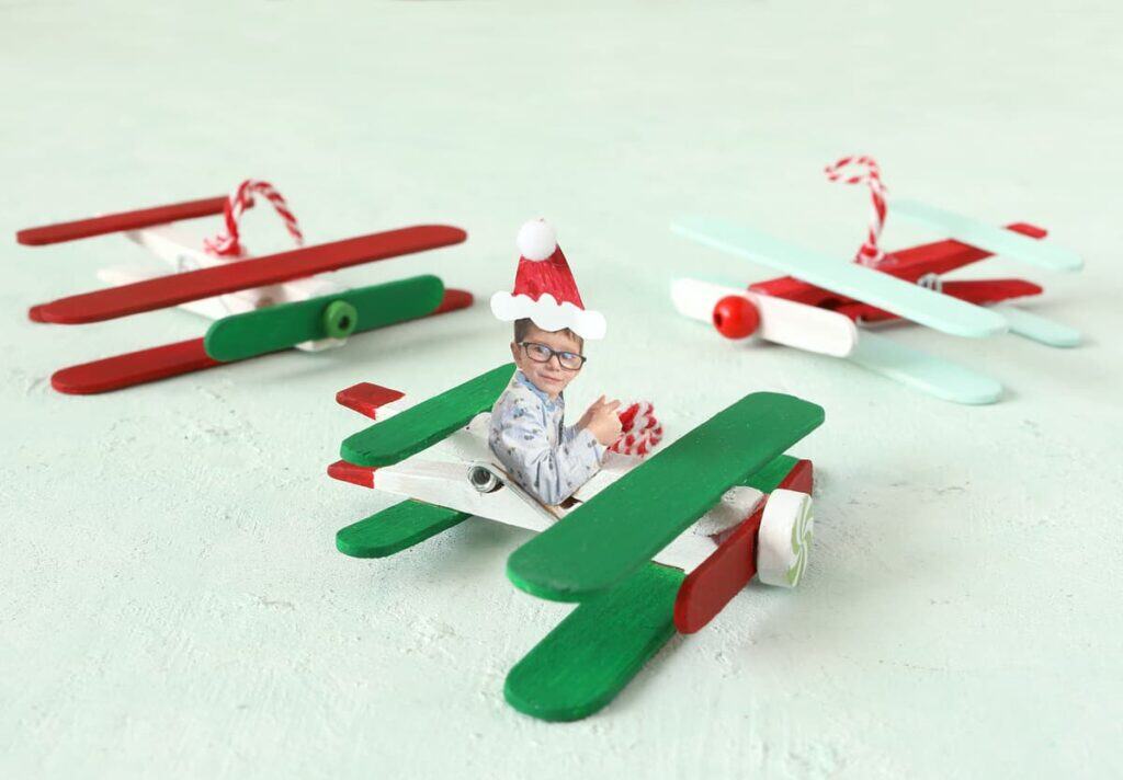 Popsicle Stick Airplane Christmas Ornament by the Craft Patch Blog
