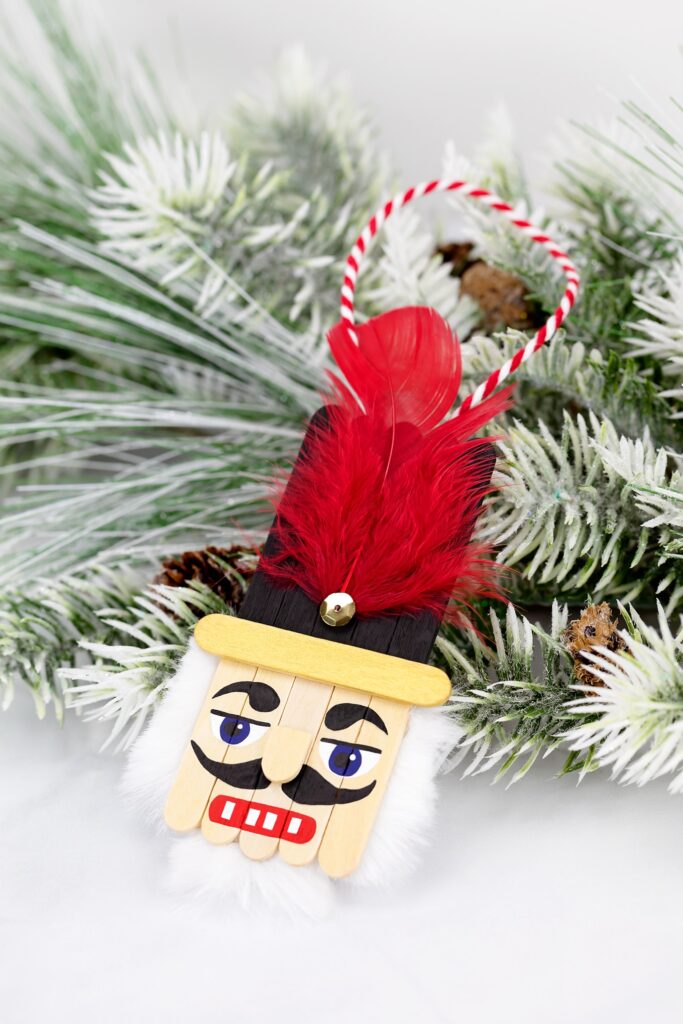 Popsicle Stick Nutcracker Ornament by Fireflies and Mudpies