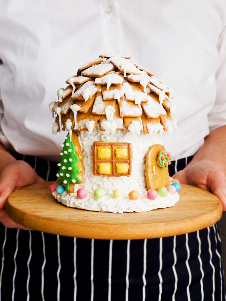 Classic Snowy Gingerbread Cottage with Cookie Shingle Roof