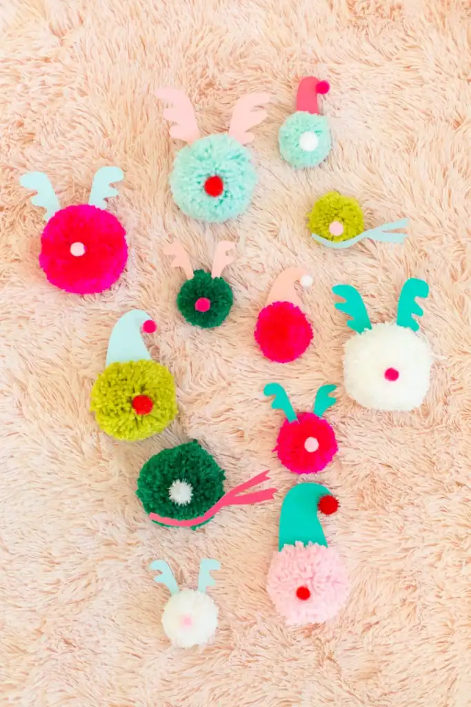 Christmas Pom-Pom Ornaments by Lovely Indeed