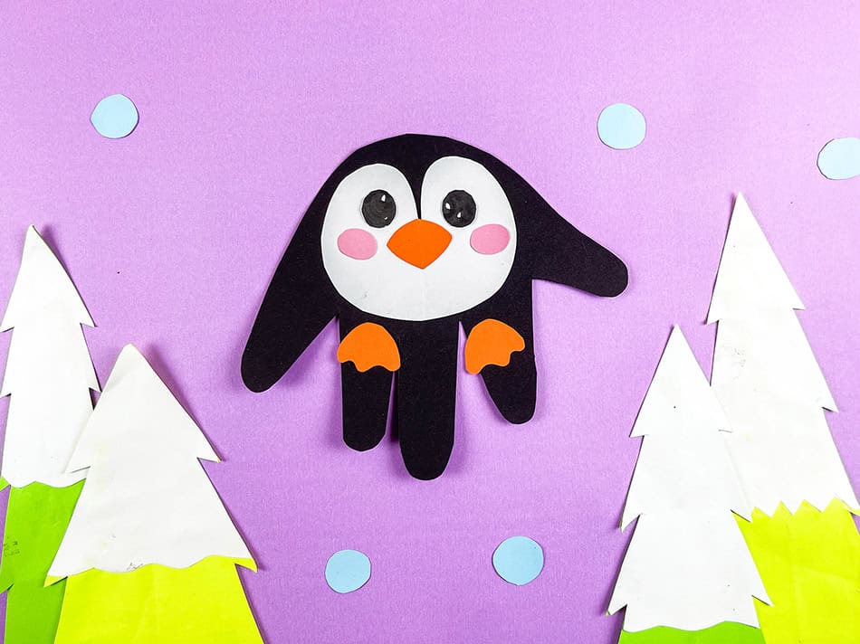 DIY Arctic Penguin Handprint Winter Craft For Kids