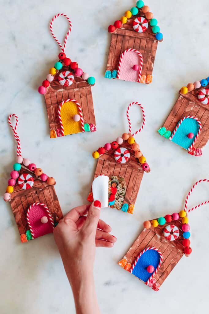 DIY Popsicle Stick Gingerbread House Ornaments by Studio DIY
